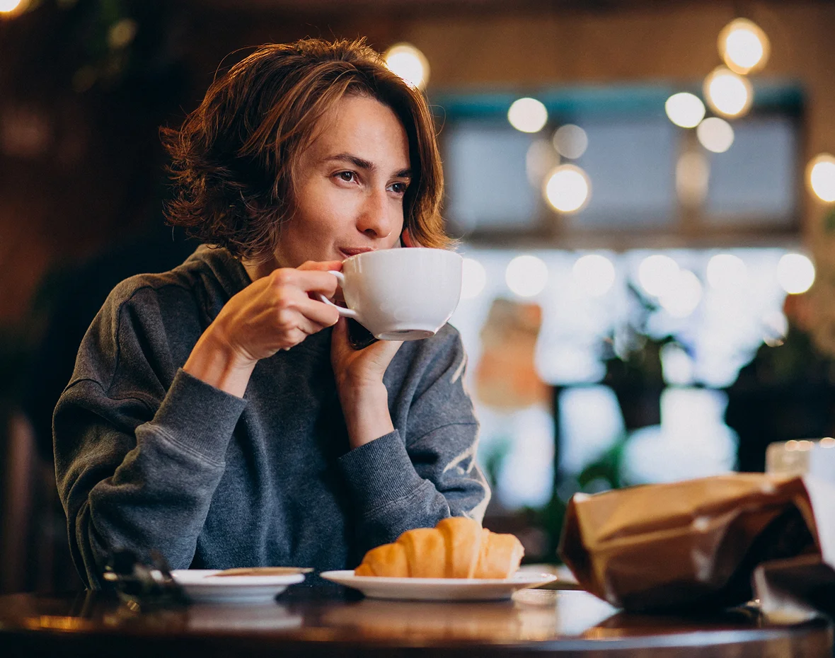 Woman drinking coffee